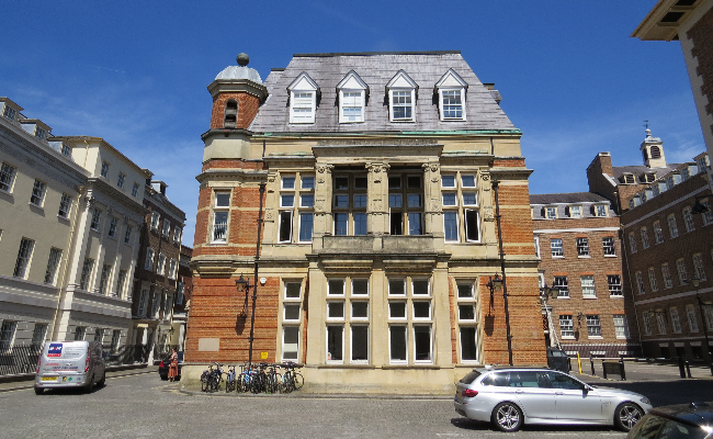 A stone and brick building in town