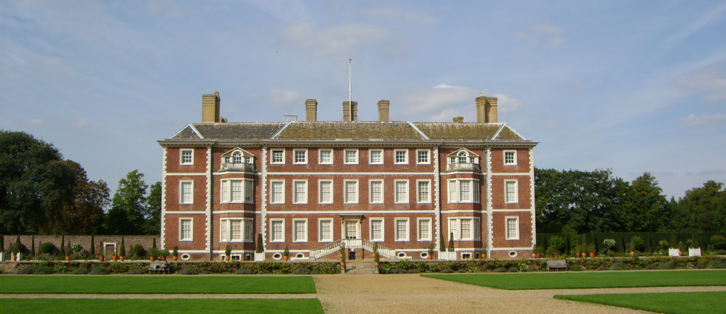A very large house with expansive gardens