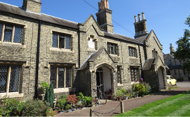 Old stone house with blue sky behind